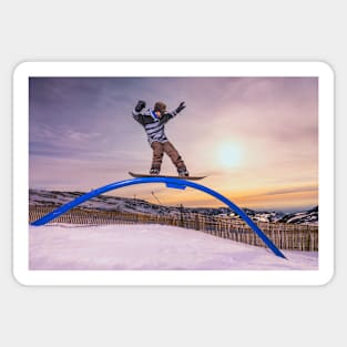 Snowboarder sliding on a rail Sticker